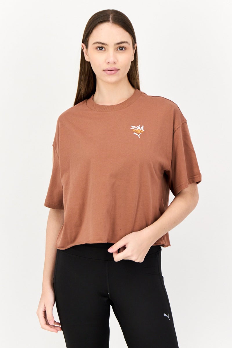 PUMA Puma x X-Girl Women Sportswear Fit Short Sleeve Outdoor T-Shirt, Brown  - Image 1