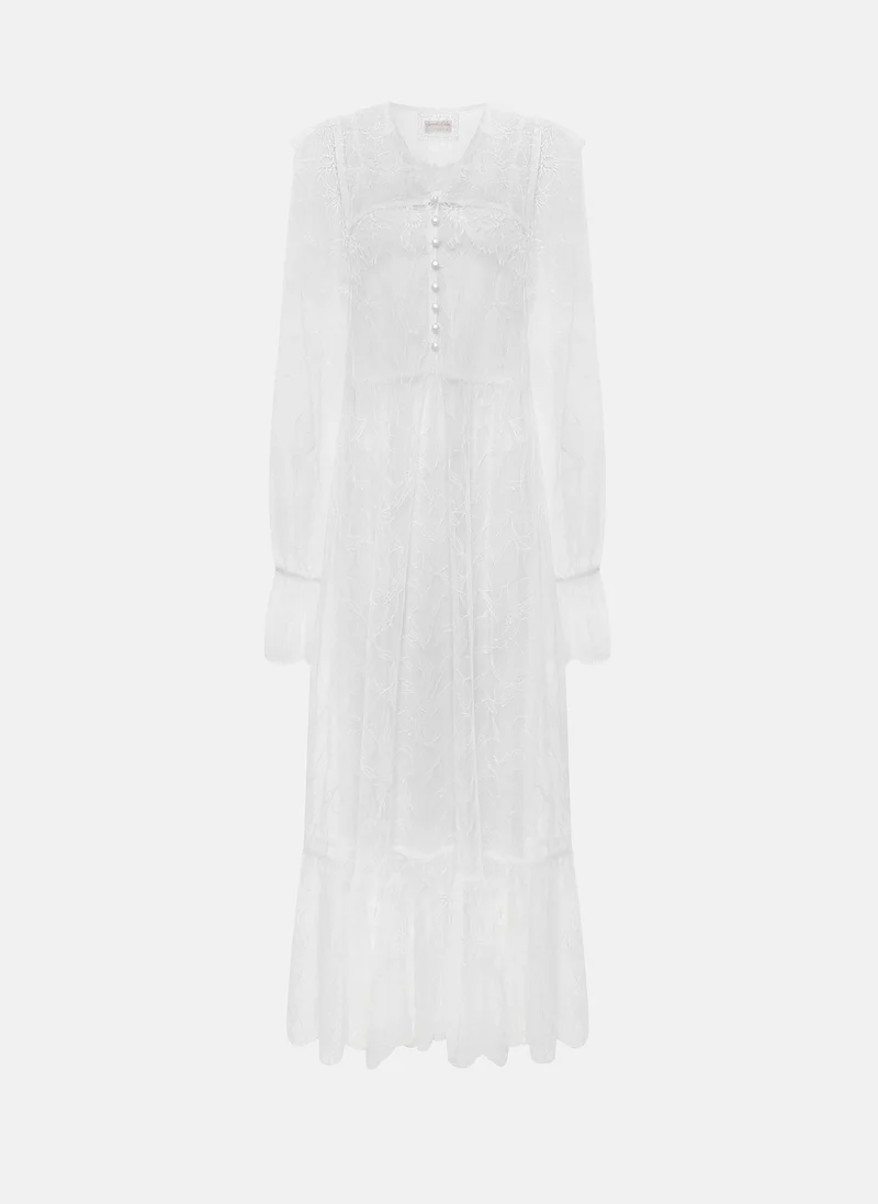 Lichi Lace cape with pearlescent button fastening
