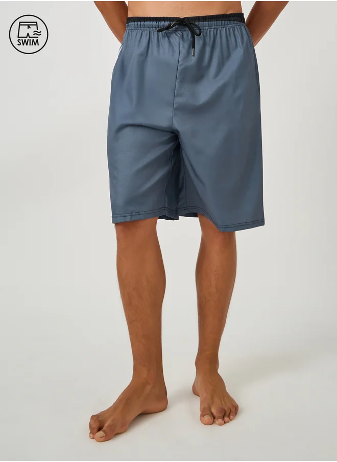 ستايلي Styli Solid Regular Fit Swim Shorts with Contrast Waistband