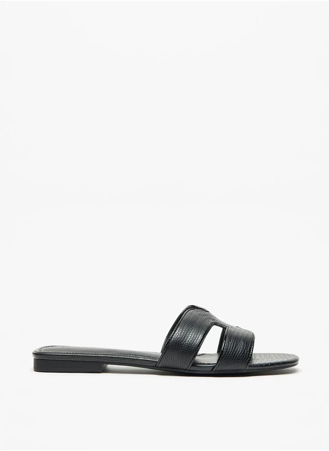 Celeste Women Textured Slip-On Flat Sandals