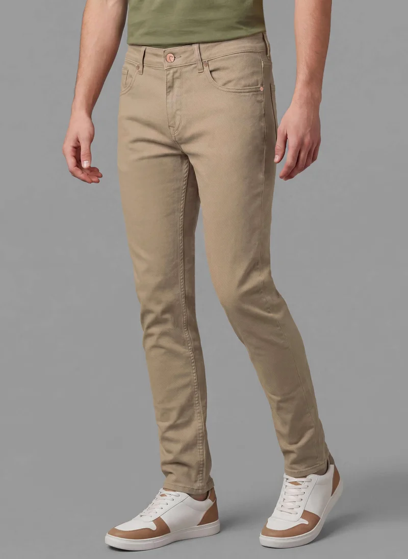 Being Human Khaki Men Straight Fit Mid-Rise Stretchable Jeans for Men | Best Price UAE