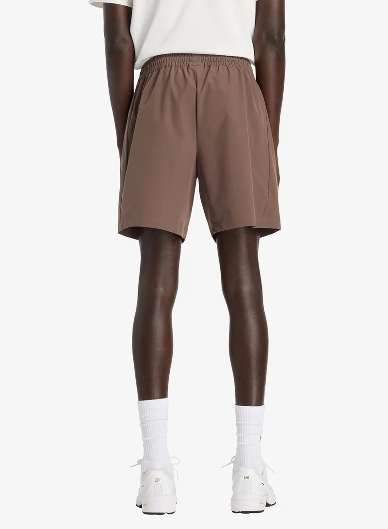 New Balance 7" Athletics Stretch Woven Shorts