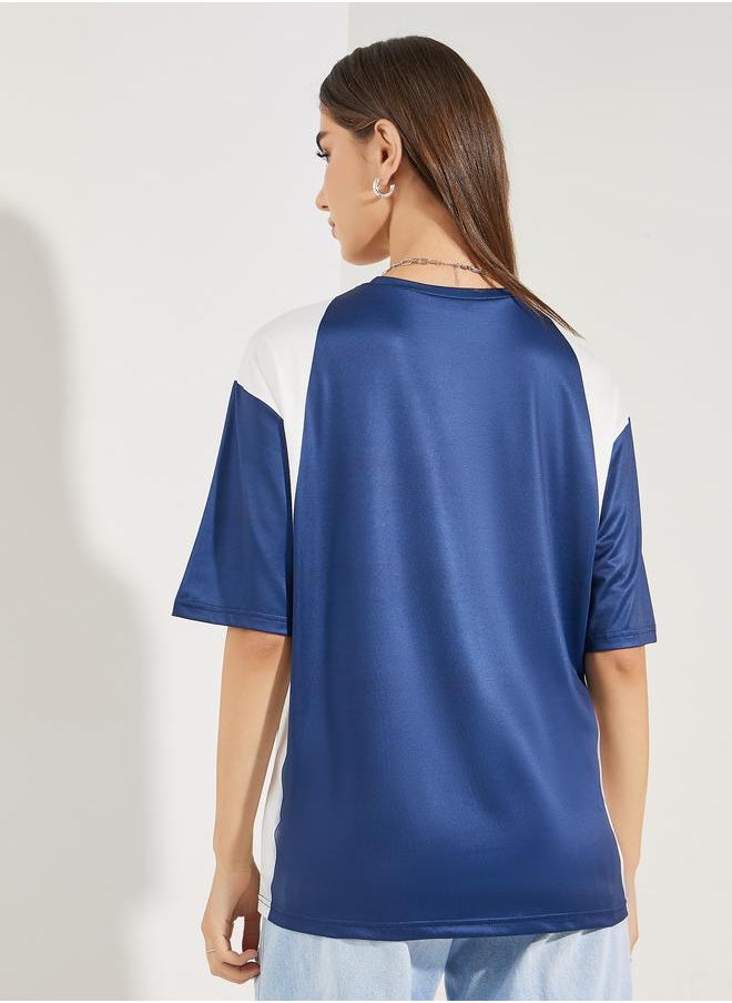 Oversized Graphic Print Contrast Panel T-Shirt - pzsku/Z8CA5AD0E3ECEA9510A71Z/45/_/1723454334/fb074600-cd99-42e0-9919-d3ee7450954a