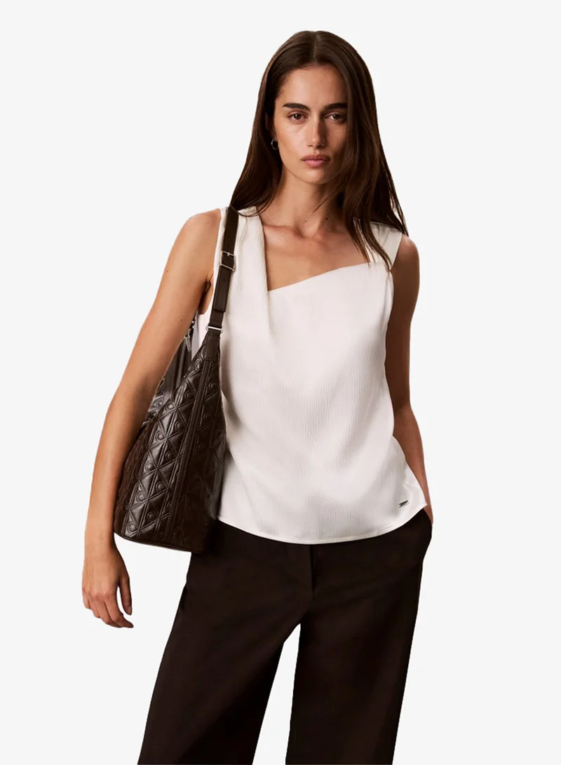 Calvin Klein  Monogram Hardware Curved Shoulder Bag for Women | Best Price UAE