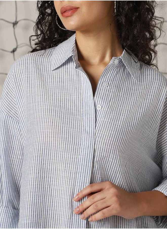 Hubberholme Women Shirts in Blue featuring Oversized fit with a strip pattern, spread collar collar, collar neckline, full sleeve, secured with button closure, crafted from 100% cotton – perfect for elevating your everyday style.
