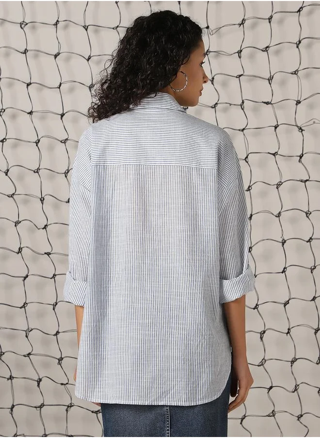 Hubberholme Women Shirts in Blue featuring Oversized fit with a strip pattern, spread collar collar, collar neckline, full sleeve, secured with button closure, crafted from 100% cotton – perfect for elevating your everyday style.