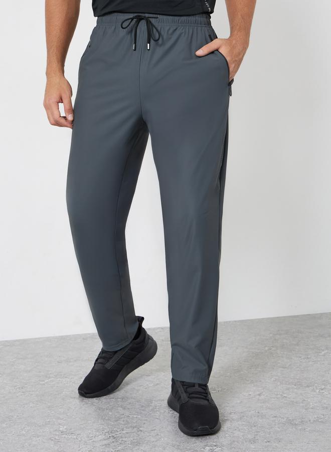 Styli Active Men Relaxed Track Pant with Side Print and Zipper Detail - Image 1