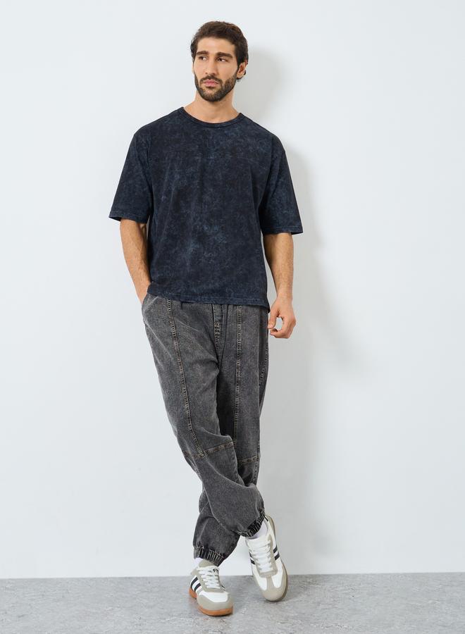 ستايلي تيشيرت واسع مغسول بلون أسود للرجال - Image 2