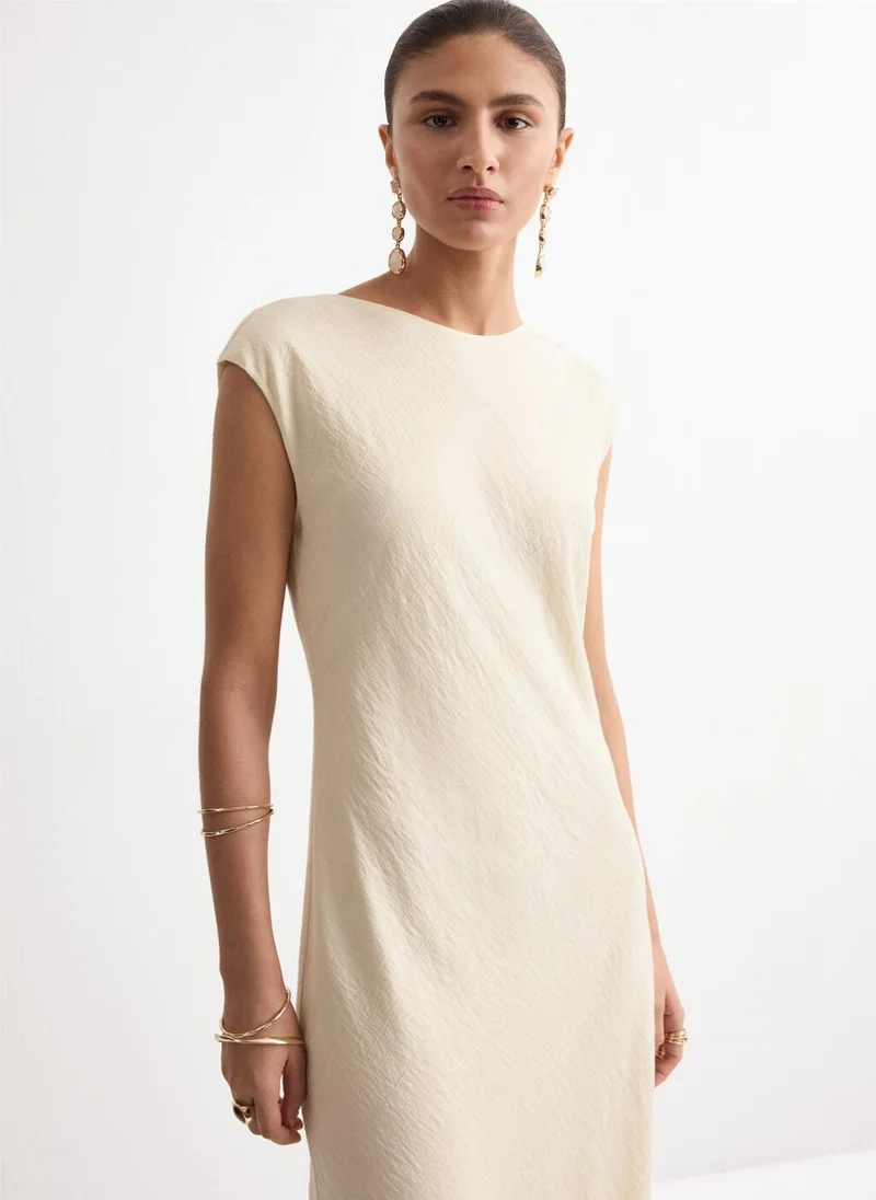 MANGO  Open-back textured dress for Women | Best Price UAE