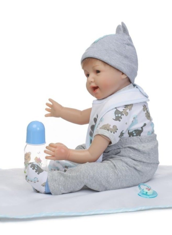 دمية ريبورن للأطفال مع لعبة احتضان محشوة مقاس 22 بوصة قابلة للتحريك على مفاصل الذراعين والساقين 22بوصة - Image 3