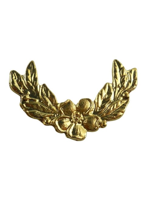 A luxurious fashion accessory pin with an elegant and distinctive design