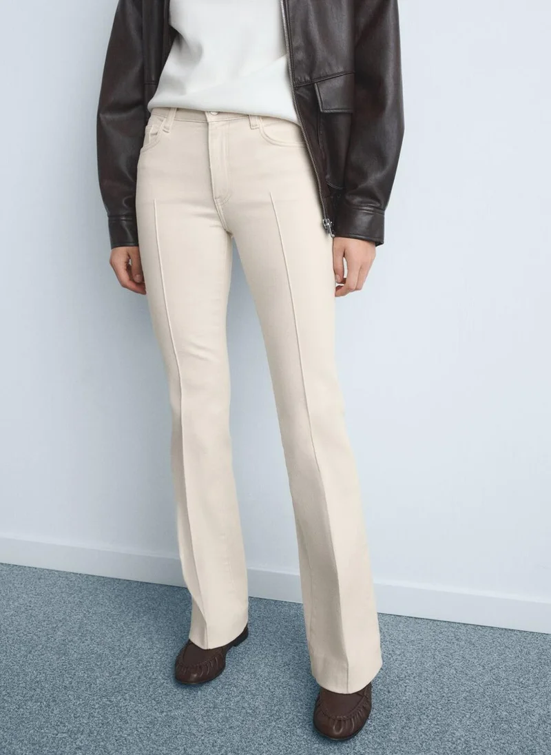 MANGO Mid-rise flared jeans