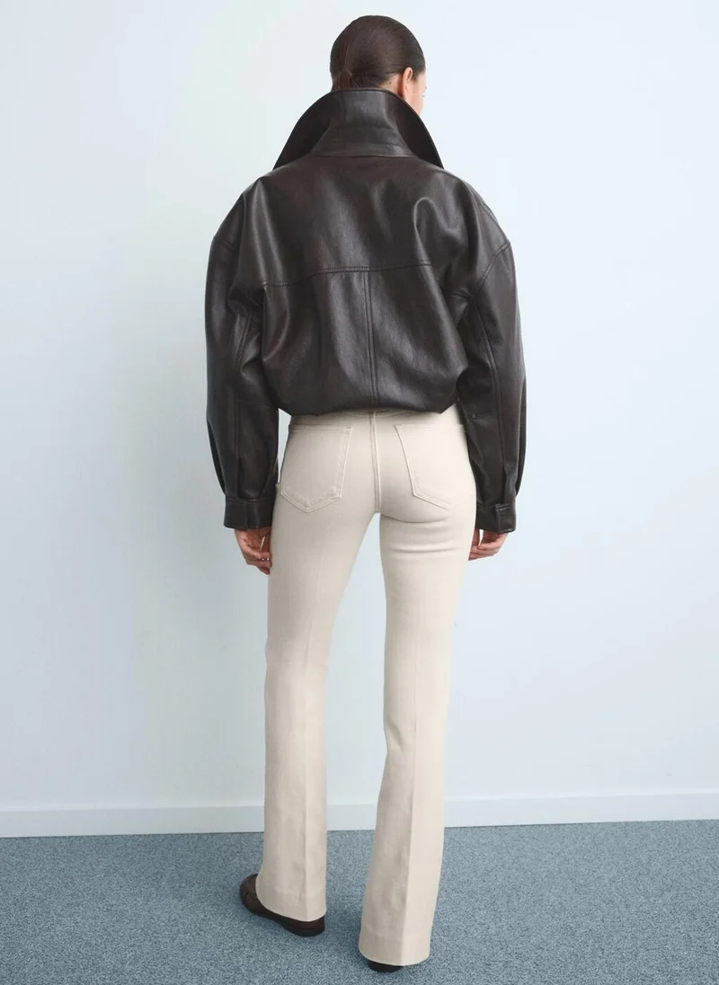 MANGO Mid-rise flared jeans