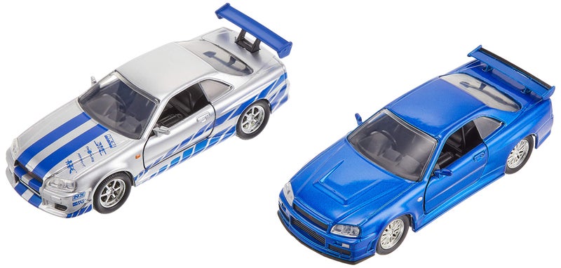 Jada Toys سيارة داي كاست 1:32 سريعة وغاضبة - نيسان سكايلاين GT-R R34 فضية ونيسان GT-R R34 زرقاء للأطفال والبالغين - Image 1