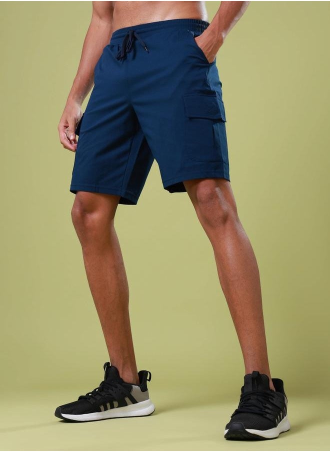 Men Solid Slim Fit Sports Shorts with TS FLEXI - pzsku/Z8CFF4A6F7A878748259FZ/45/_/1740487982/eb73e82b-b6eb-45cd-8afa-46f9b1261718