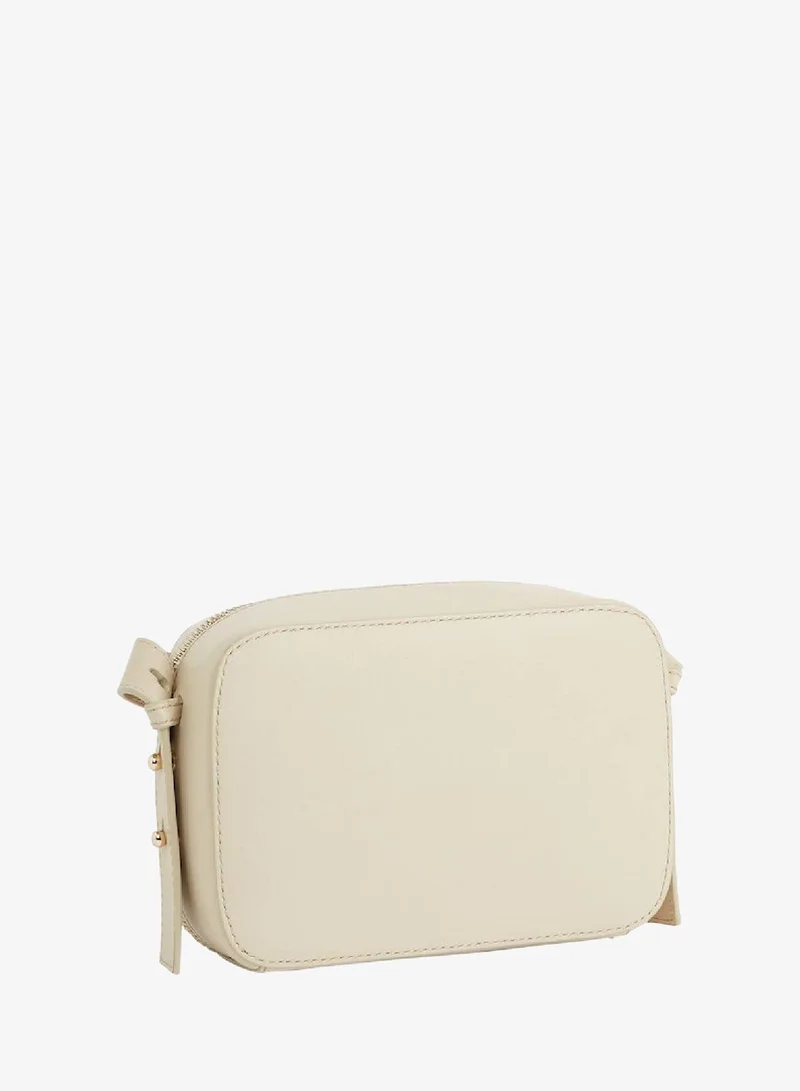 Tommy Hilfiger Cream Metal Logo Small Crossover Bag for Women | Best Price UAE