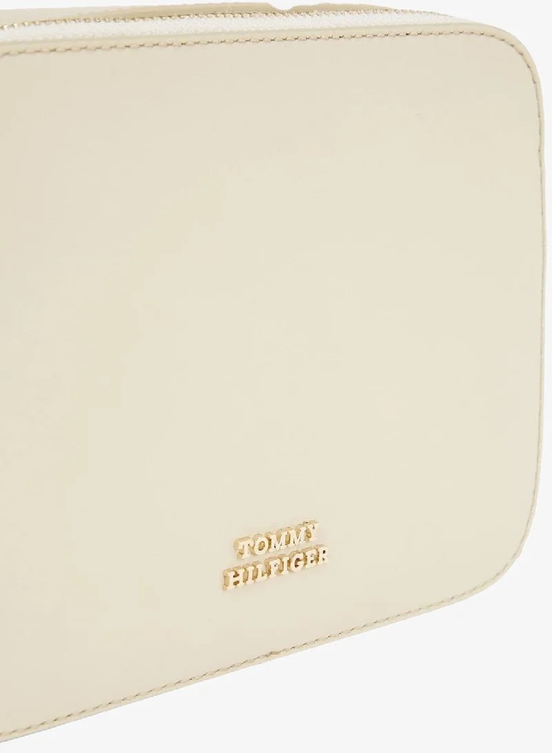 Tommy Hilfiger Cream Metal Logo Small Crossover Bag for Women | Best Price UAE