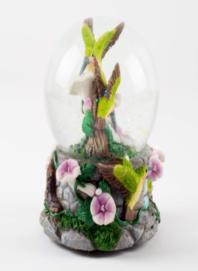 إيلانز ديزاينز مجسم طيور الطنان الخضراء من إيلانز ديزاينز، يرفرف بأزهار أرجوانية، مناسب لوضعه على الطاولة، قطره 100 مم، متين، مزين ببريق لامع، كرة ثلجية مائية تعزف لحن "أنت تنير حياتي". - Image 2