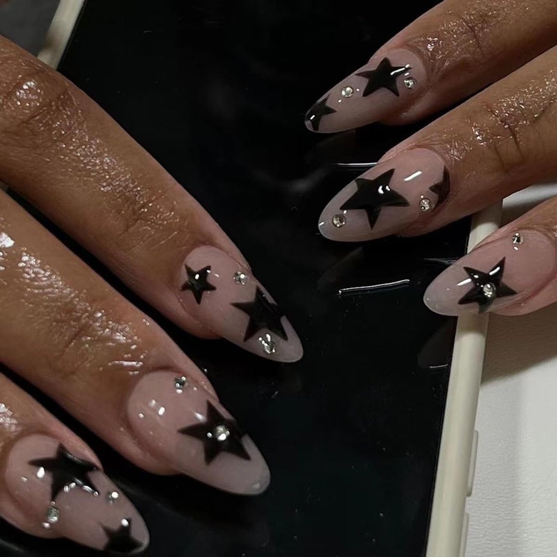 CTTHNBD Press on Nails Almond - Medium Fake Nails with Black Star Design - Rhinestone, Nude False Nails Press ons - for Women 24 Pcs - Image 1