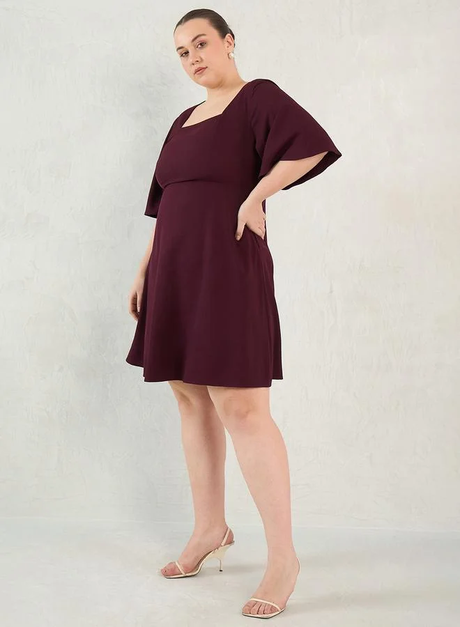 Femmella Plus Size Purple Knee Length Dress