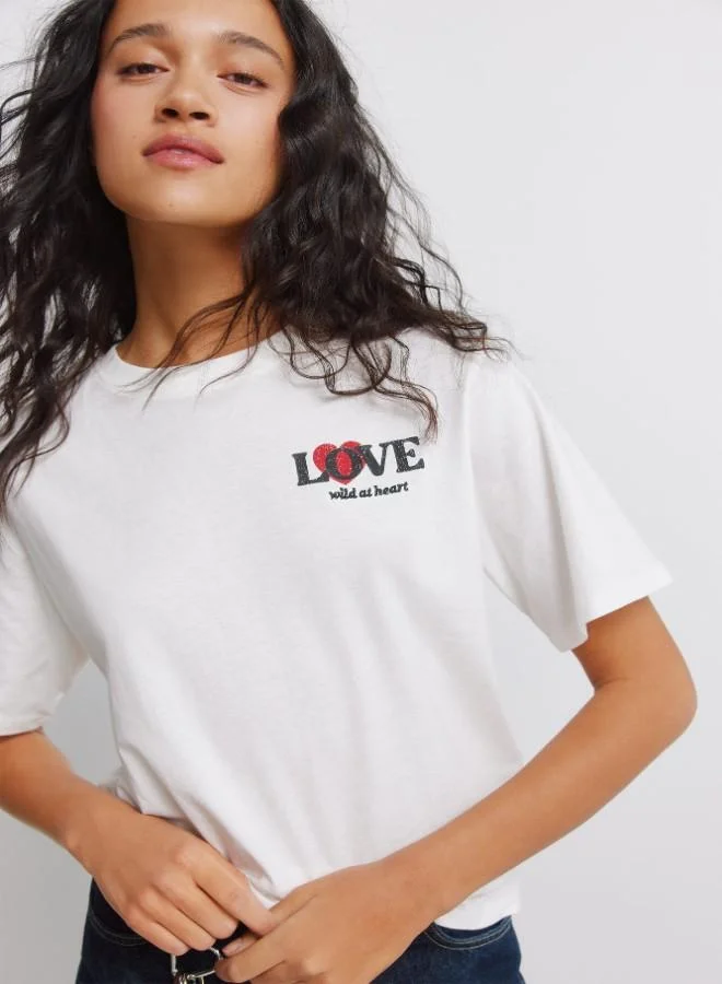 Springfield  Sustainable cotton front and back 'Love' and heart print short-sleeved T-shirt for Women | Best Price UAE