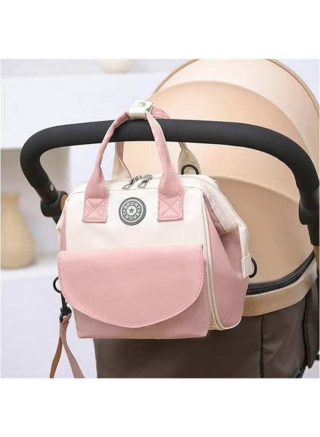 أجريون حقيبة حفاضات صغيرة للأولاد والبنات - حقيبة حفاضات مقاومة للماء مع جيوب معزولة، وحقائب تنظيم حفاضات ذكية صغيرة للأنشطة الخارجية، هدية مثالية لحفلات استقبال المولود (وردي) - Image 3