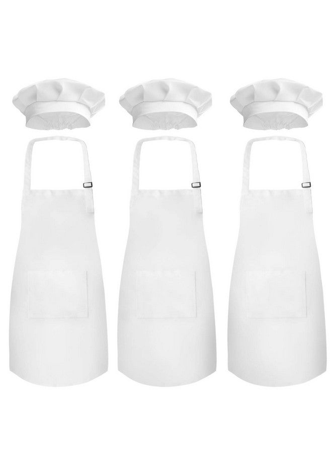 نوفيلتي بليس طقم مآزر للأطفال مع قبعة طاهٍ من نوفيلتي بليس (3 قطع) - مريلة أطفال لطيفة على البشرة مع جيب - ملابس للطبخ والخبز والرسم والتدريب - مقاس الأطفال (6-12 سنة، لون أبيض) - Image 1