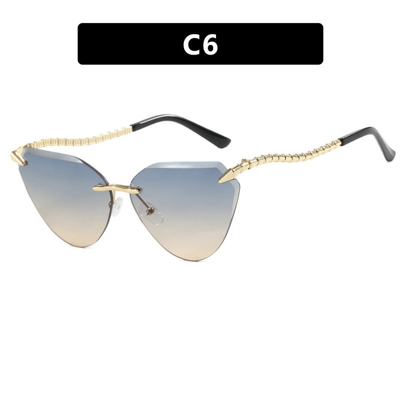 Generic Snake leg frameless cut cats eye sunglasses European and American personality sunglasses fashion hot girl sunscreen womens sunglasses trend Blue orange 