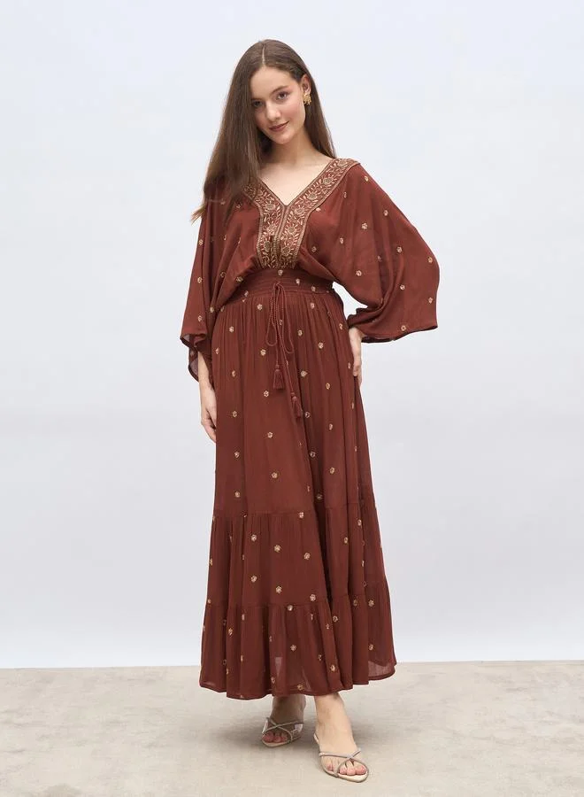 ستايلي Styli Embroidered Ruffled Hem Smocked Detail A-Line Maxi Dress