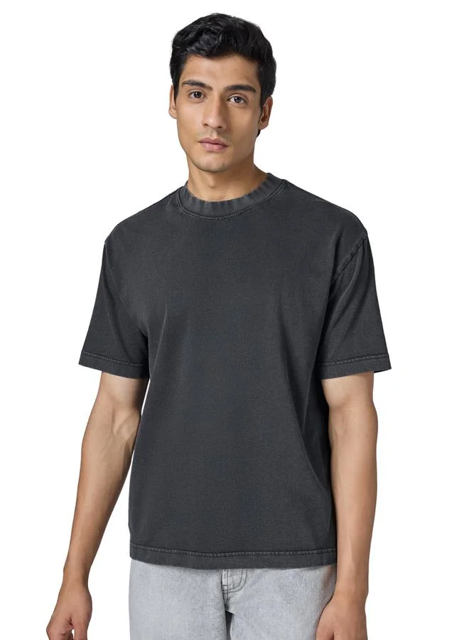 اكس واي اكس اكس تيشيرت قطني أسود مُغسول بحمض