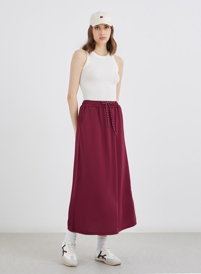 تايك تو تنورة ميدي بحافة واسعة - Image 1