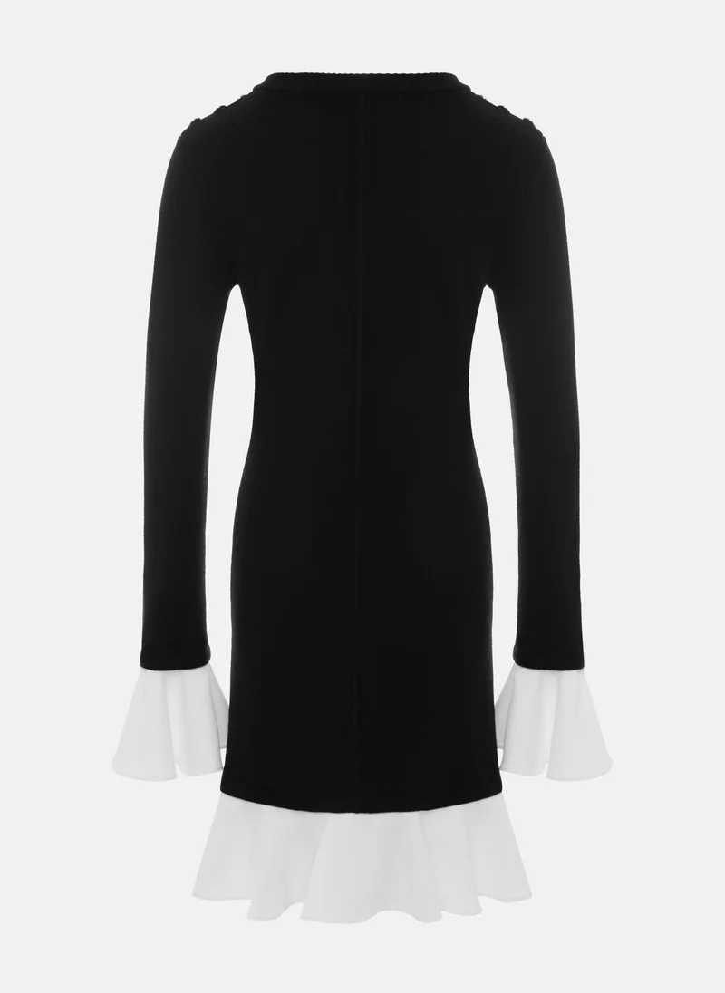 Lichi Mini knitted dress with contrasting flounces on the cuffs and skirt