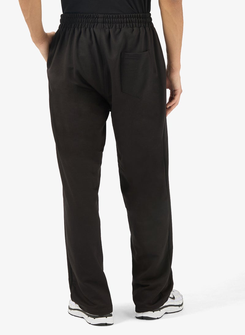 سفنتي فايف بيسيكس بنطال رياضي بطبعات جرافيك وحافة مفتوحة - Image 3