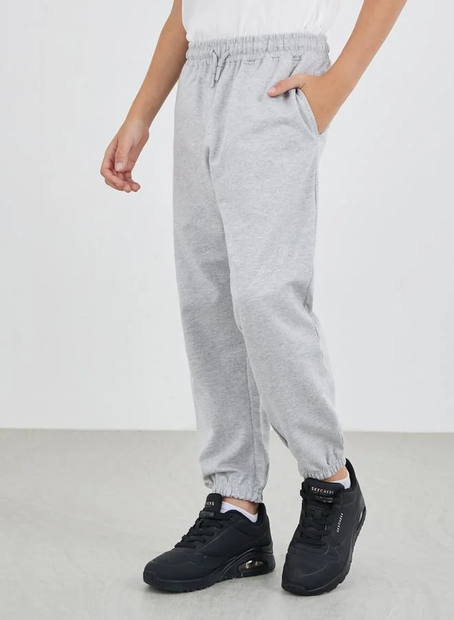 ستايلي Styli Grey Solid Cuffed Joggers with Slip Pockets