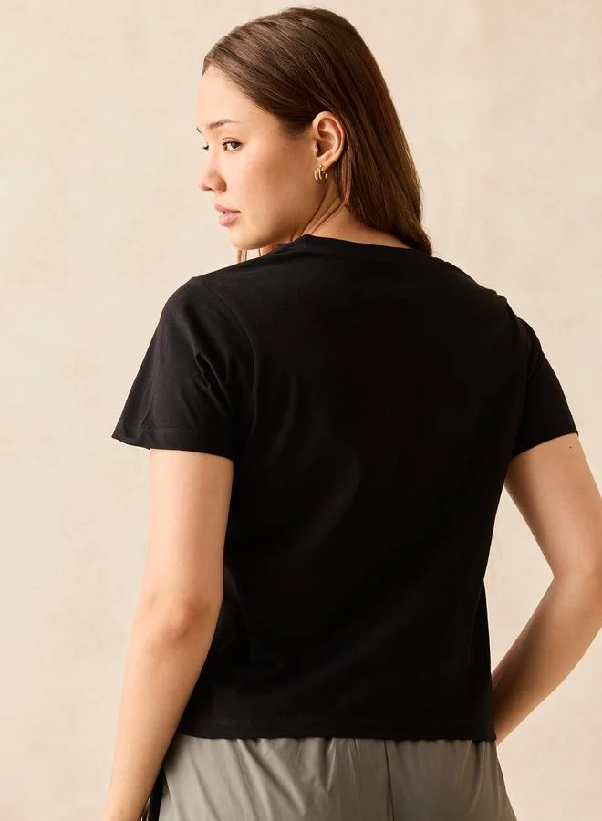 Outzidr  Black Crew Neck Graphic T-Shirt - 100% Cotton for Women | Best Price UAE