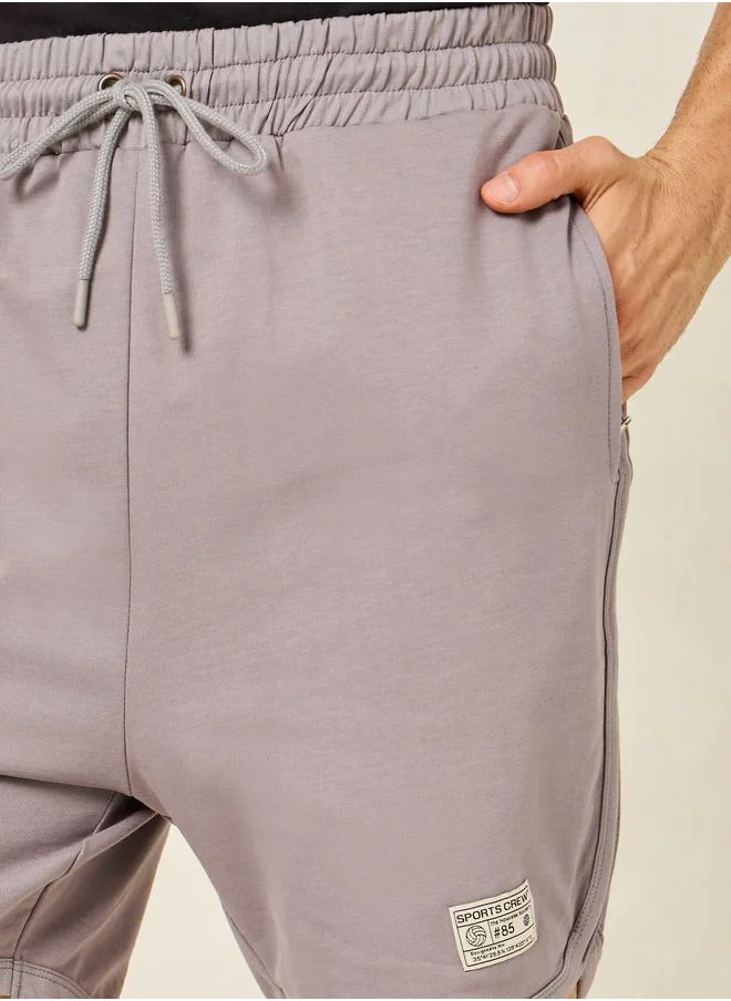ستايلي Badge Detail Cycling Terry Shorts