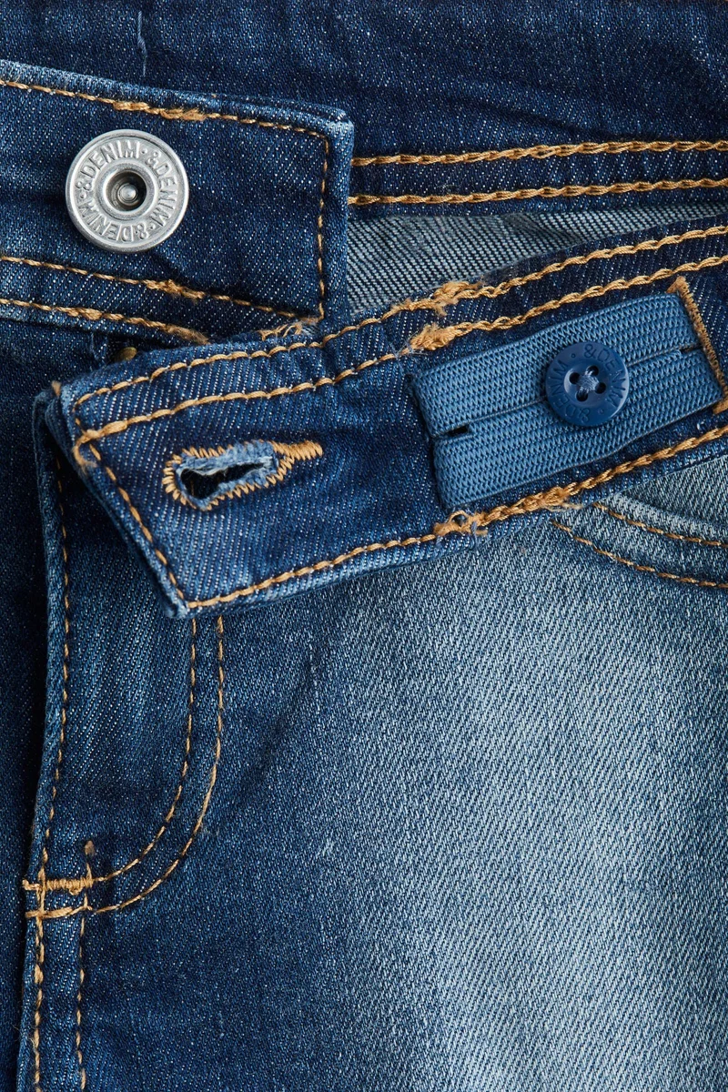 اتش اند ام جينز بخصر منخفض وساق بحافة واسعة