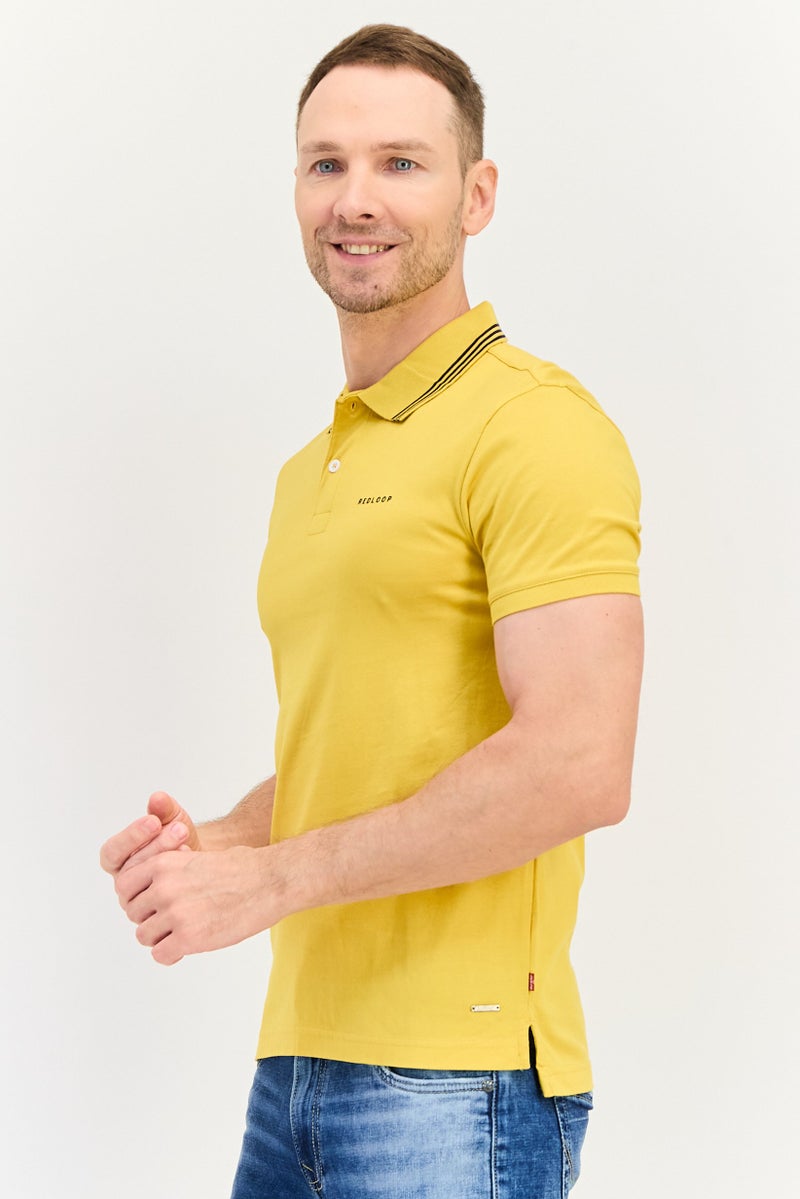 Levi's قميص بولو قصير الأكمام من ليفيس × ريدلوب للرجال بتصميم عادي، لون خردل - Image 2