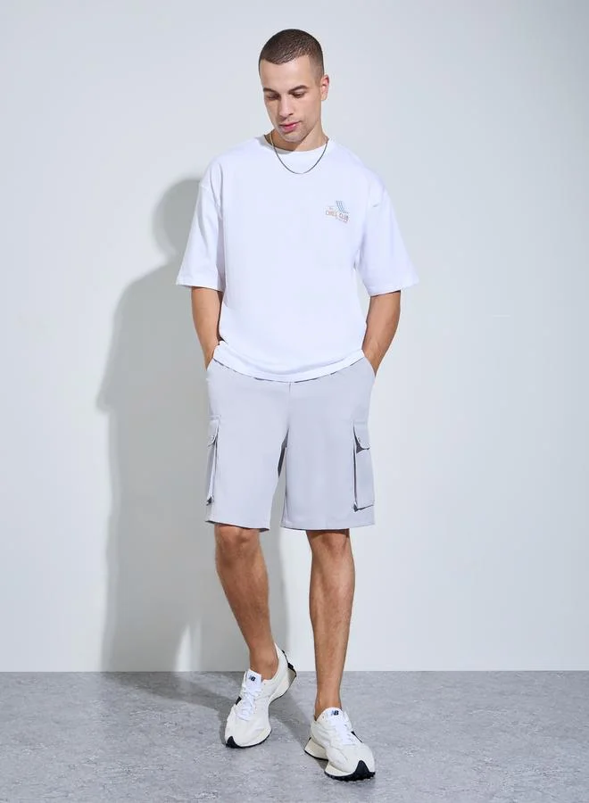 Styli Men White Graphic Print Oversized T-Shirt