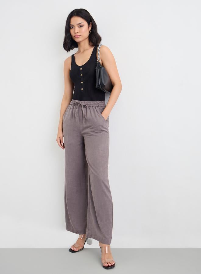 ستايلي بنطال بأرجل واسعة بمطهر دنيم مع أربطة - Image 1