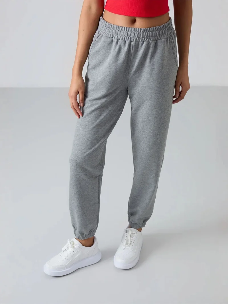 تومي لايف TOMMY Women's High-Waist Relaxed Fleece Joggers