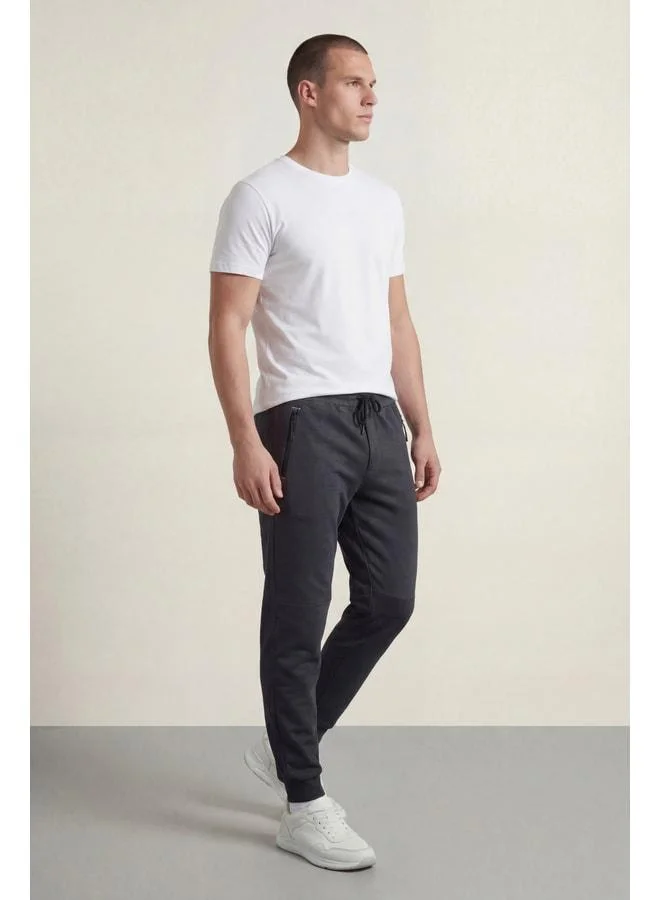 mmetalic Men's Anthracite Standard Fit Regular Cut Jogger Sweatpants with Zip Pocket and Elasticated Ankles.