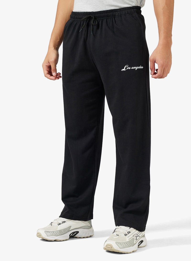 سفنتي فايف بيسيكس سراويل رياضية فضفاضة مطبوعة بشعار وأساور - Image 1