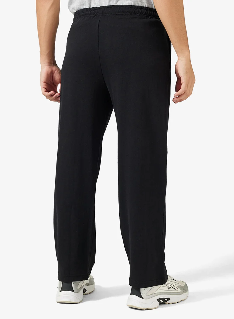 سفنتي فايف بيسيكس سراويل رياضية فضفاضة مطبوعة بشعار وأساور