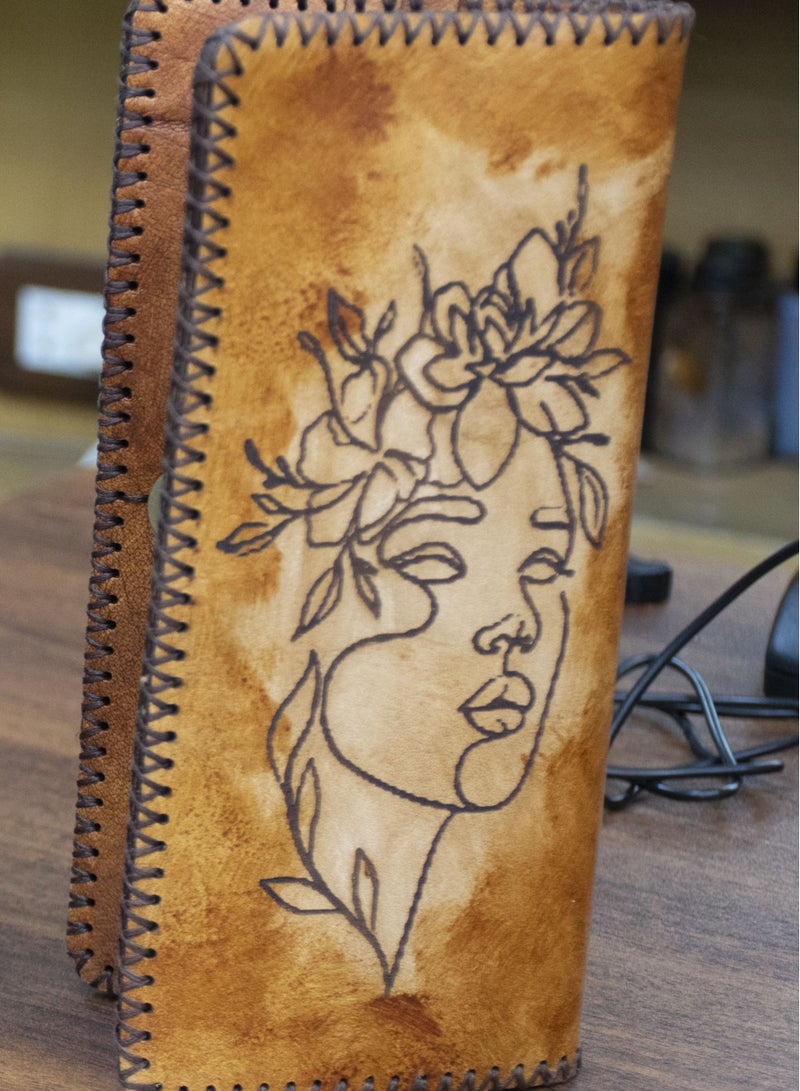 ✨ Handmade Genuine Leather Wallet – Timeless Elegance & Function 100% genuine leather – handcrafted Artistic laser engraving Magnetic clasp 8 card slots 2 zippered pockets + 2 additional compartments Size: 9×20 cm 🛒 Available now on Noon  From Holy of Holies Store – where style meets craftsmanship  - Image 1