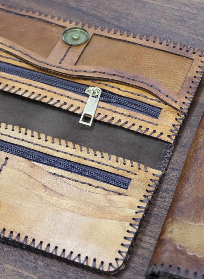 ✨ Handmade Genuine Leather Wallet – Timeless Elegance & Function 100% genuine leather – handcrafted Artistic laser engraving Magnetic clasp 8 card slots 2 zippered pockets + 2 additional compartments Size: 9×20 cm 🛒 Available now on Noon  From Holy of Holies Store – where style meets craftsmanship  - Image 3