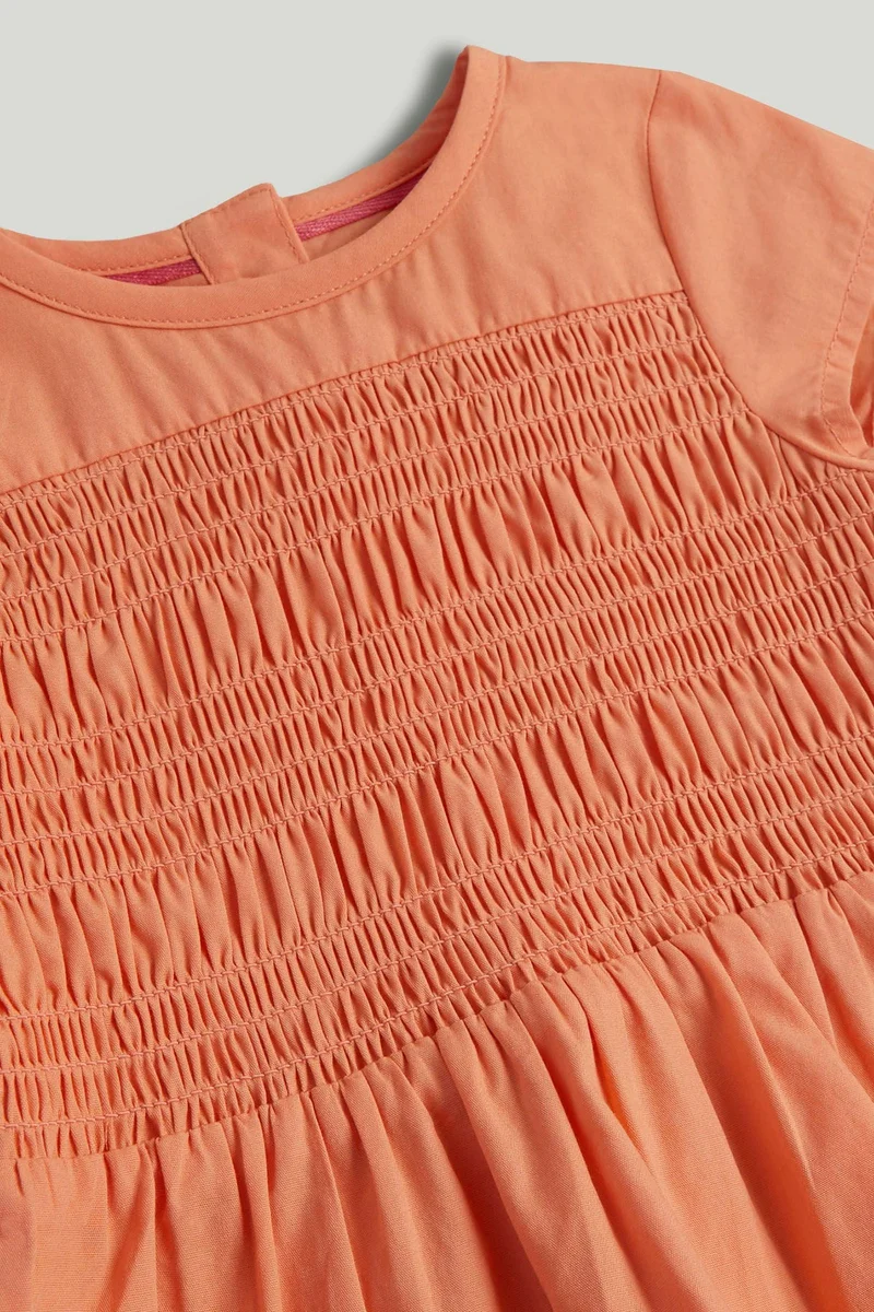 مذركير بلوزة برتقالية