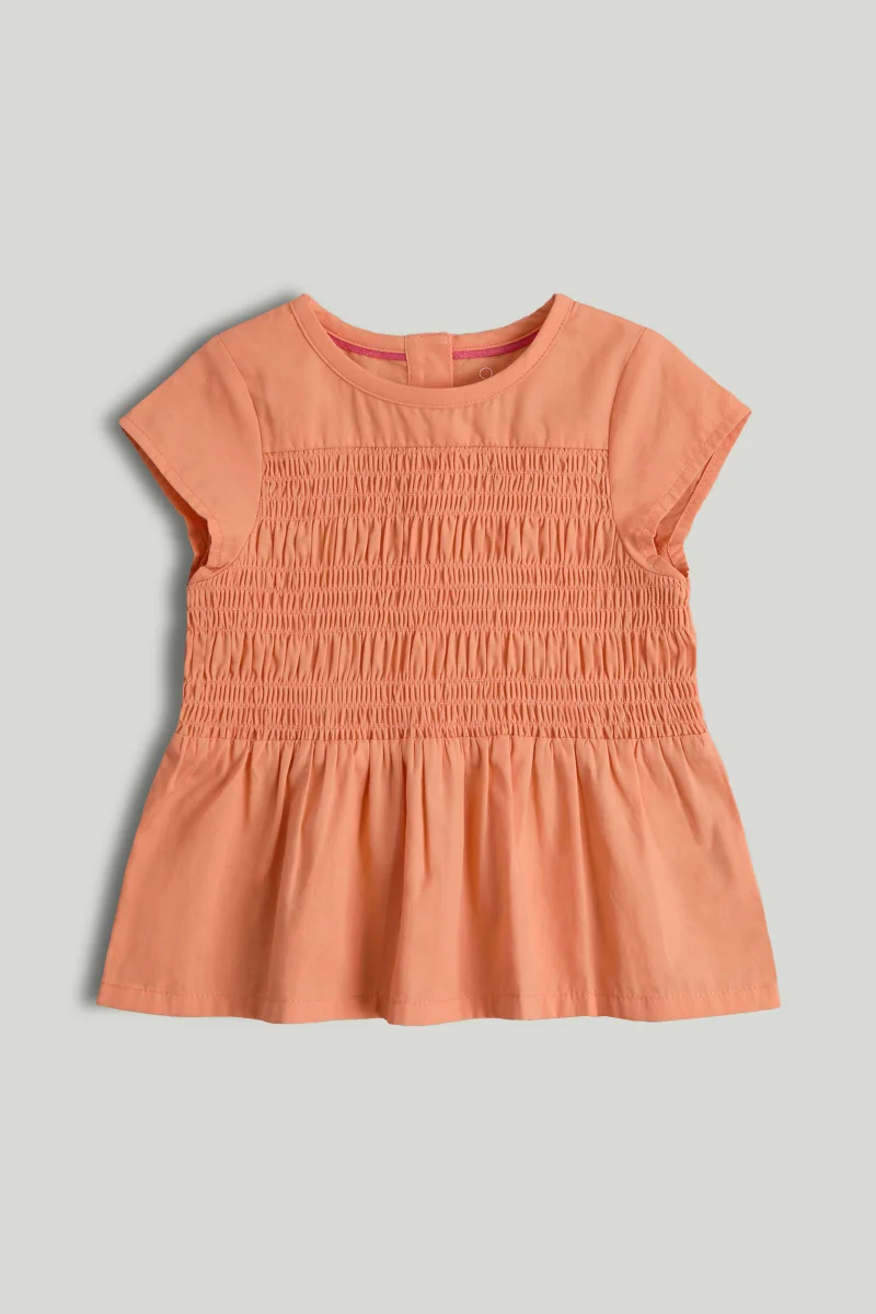 مذركير بلوزة برتقالية