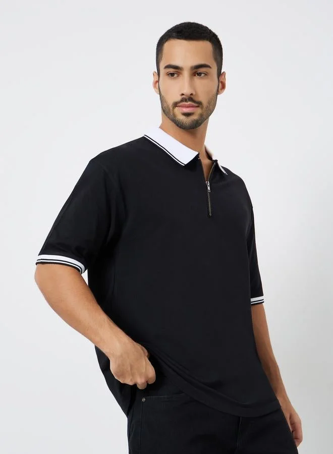 ستايلي قميص بولو بسحاب وياقة متباينة