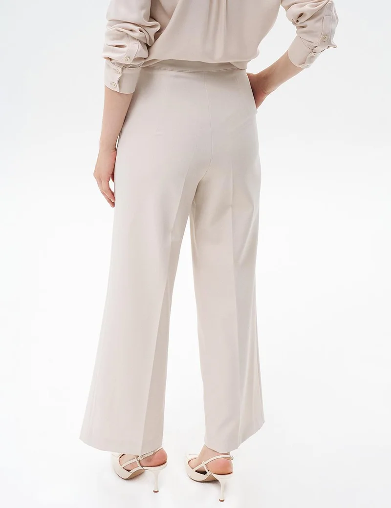 Kayra Pressed Crease Wide-Leg Pants in Stone